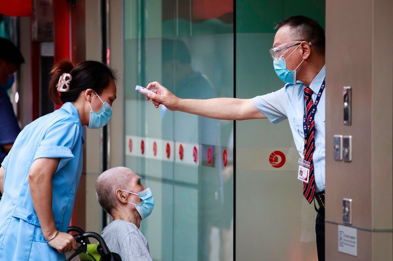 33-letnik iz Hongkonga se je po nekaj mesecih še enkrat okužil s koronavirusom (foto: profimedia)