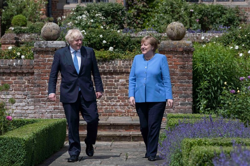 Angela Merkel britanskemu premierju napovedala lažje pogoje za vstop Britancev v Nemčijo (foto: profimedia)