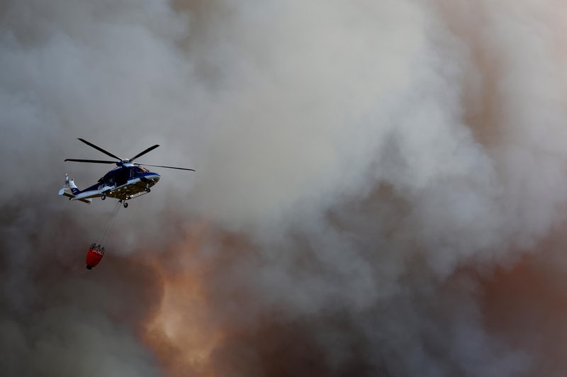 Zaradi požara ob meji s Slovenijo umrla 55-letnica (foto: Bobo)