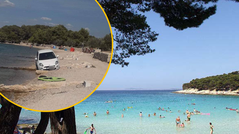 FOTO: Smešno ali zaskrbljujoče? Z avtomobilom je na plaži parkiral, kot da je eden izmed kopalcev