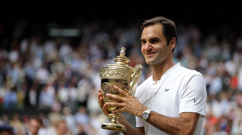 FOTO: Federer v mlajših letih oboževal Jordana, na vrata otroške sobe pa nalepil plakat prsate zvezdnice