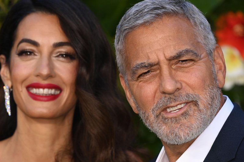 FOTO: Veljal je za najbolj zaželenega samca, a George Clooney je bil poročen, že preden je spoznal Amal (foto: Profimedia)