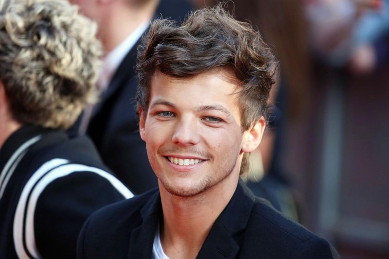 Louis Tomlinson leta 2013