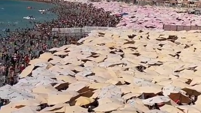 Natlačeni kot sardele: prizor s priljubljene plaže številne pustil odprtih ust (VIDEO)