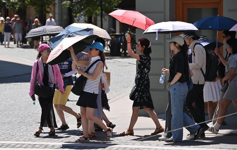 Turisti v centru Ljubljane.